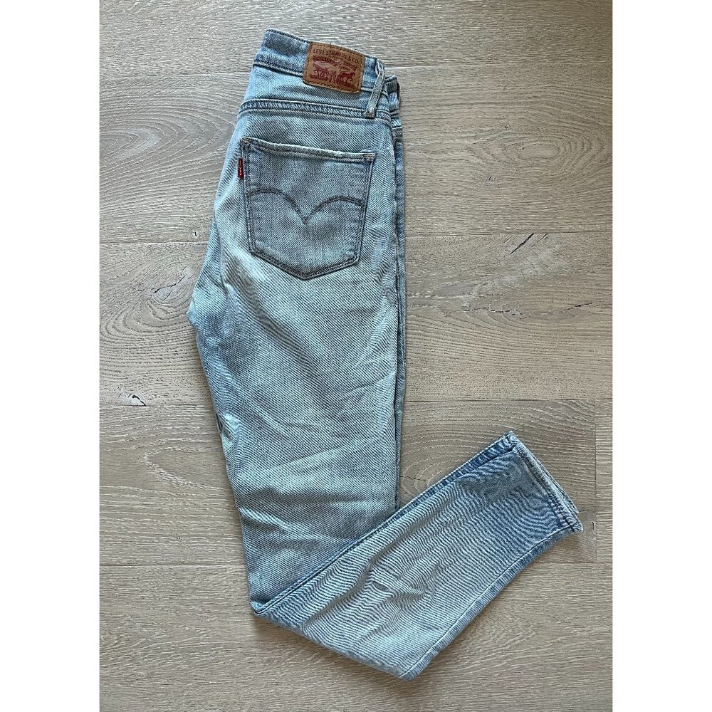 Levi's "721 High Rise Skinny" Distressed Light Blue Jeans